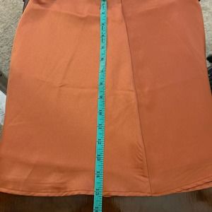 Burnt orange satin skirt, knee-high Burnt orange satin skirt, mini Sz small